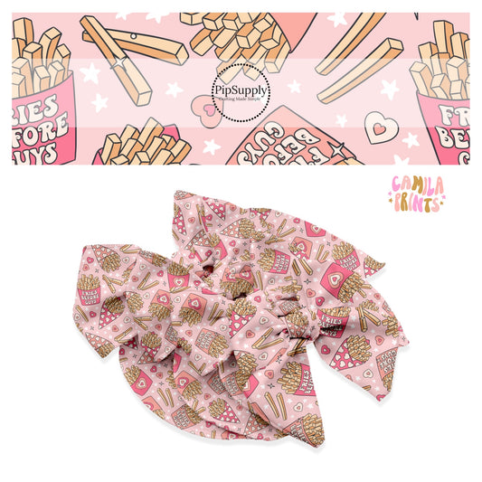 Scattered french fries with white stars on pink bow strips