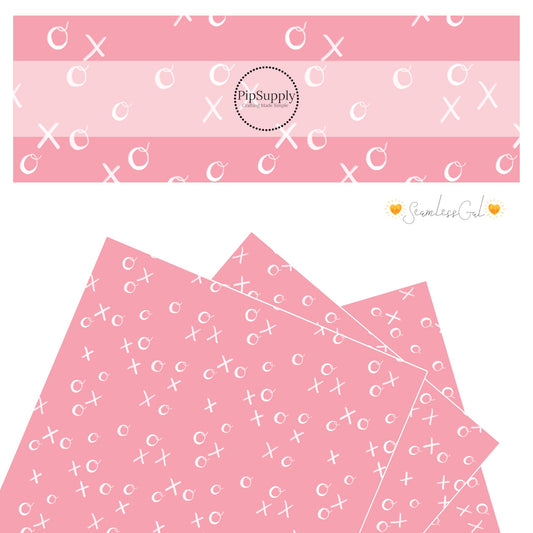 XOXO handwriting on pink faux leather sheet 