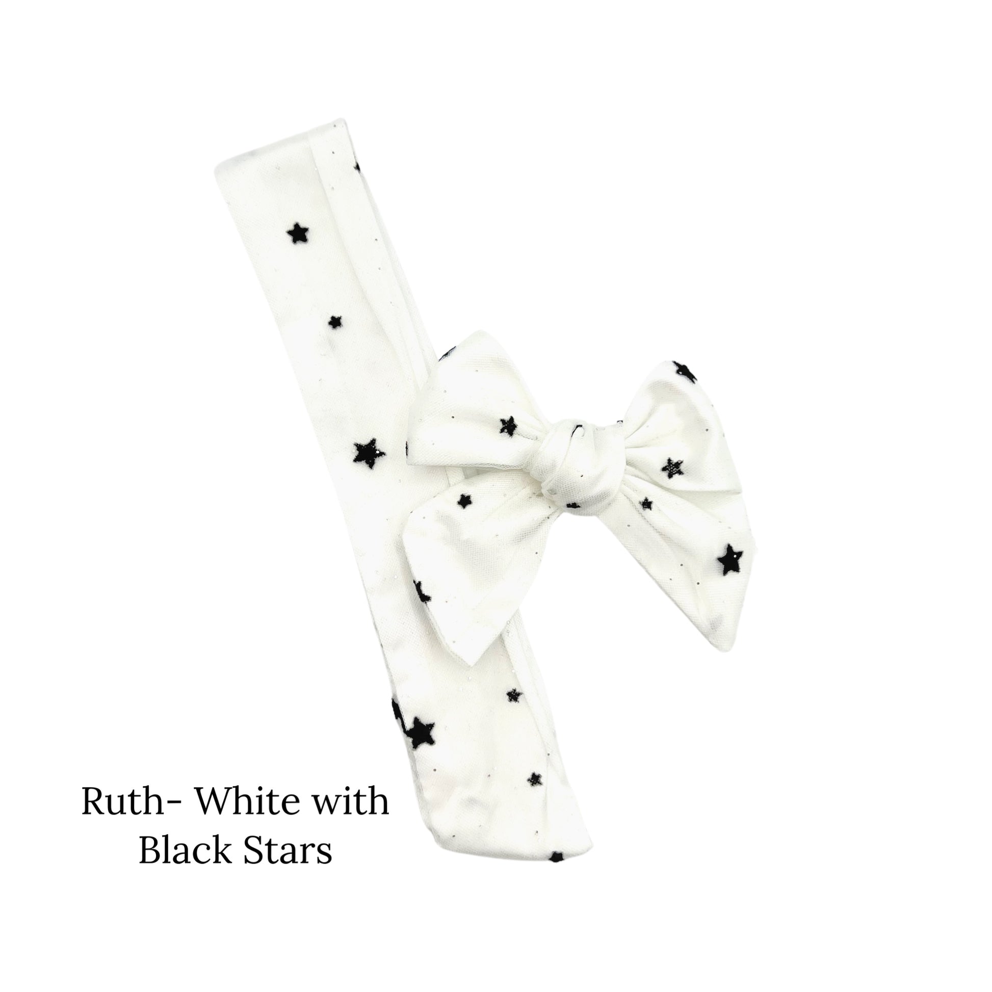 White bow with black stars