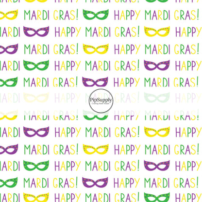 Purple, yellow, and purple mask with mardi gras written in purple, green, and yellow in capital letters bow strips