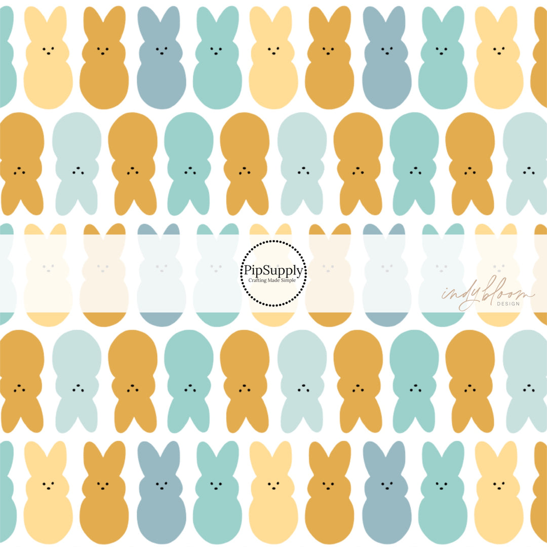 Blue, Yellow, and Teal Easter Bunnies on white fabric by the yard - Peeps Easter Bunny Fabric 