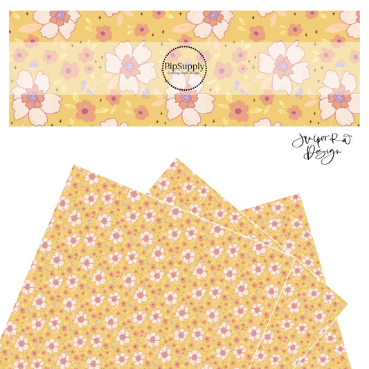 Big light pink flowers with purple centers with tiny pink flowers and stars on yellow faux leather sheets