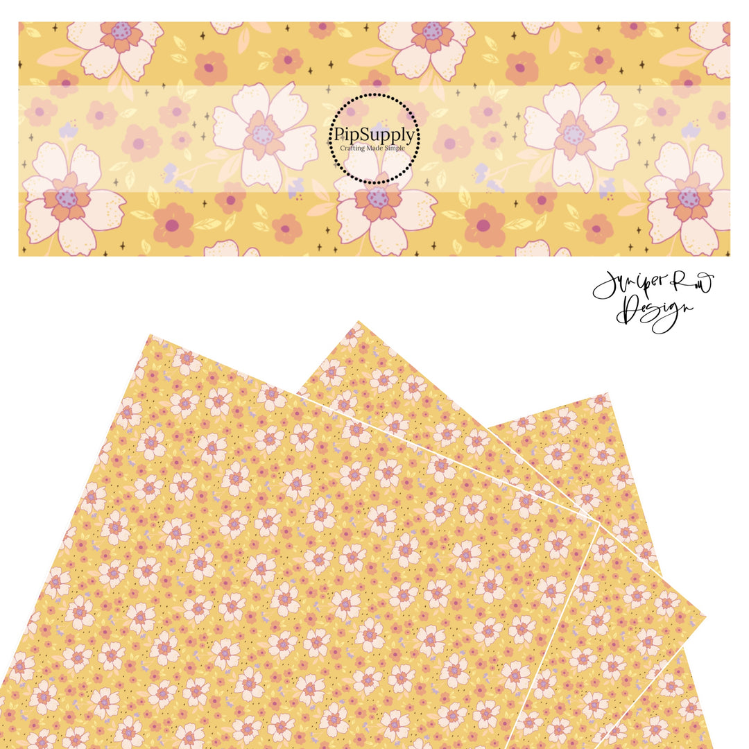 Big light pink flowers with purple centers with tiny pink flowers and stars on yellow faux leather sheets