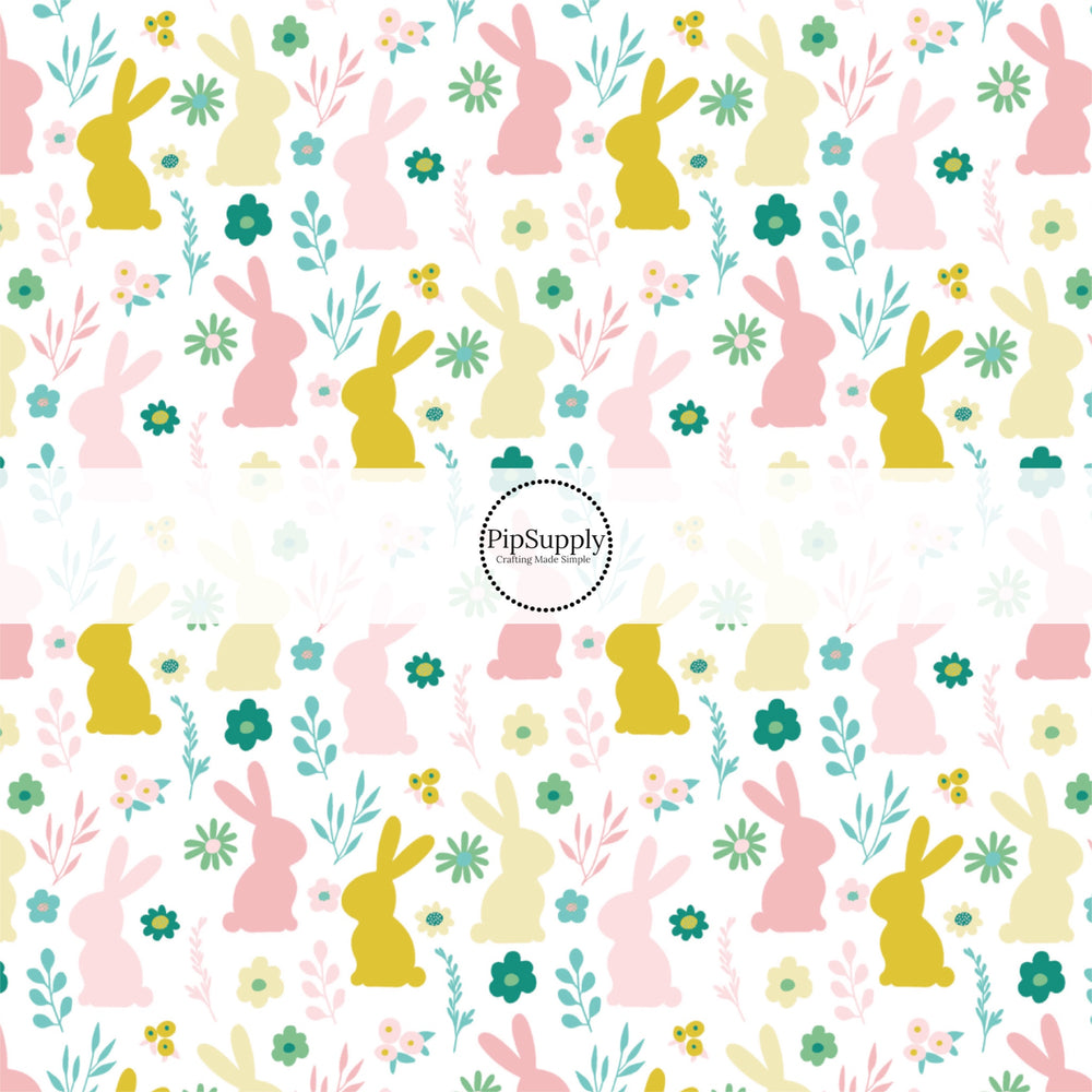 Pink, green, and yellow flowers with big pink and yellow bunnies on white bow strips