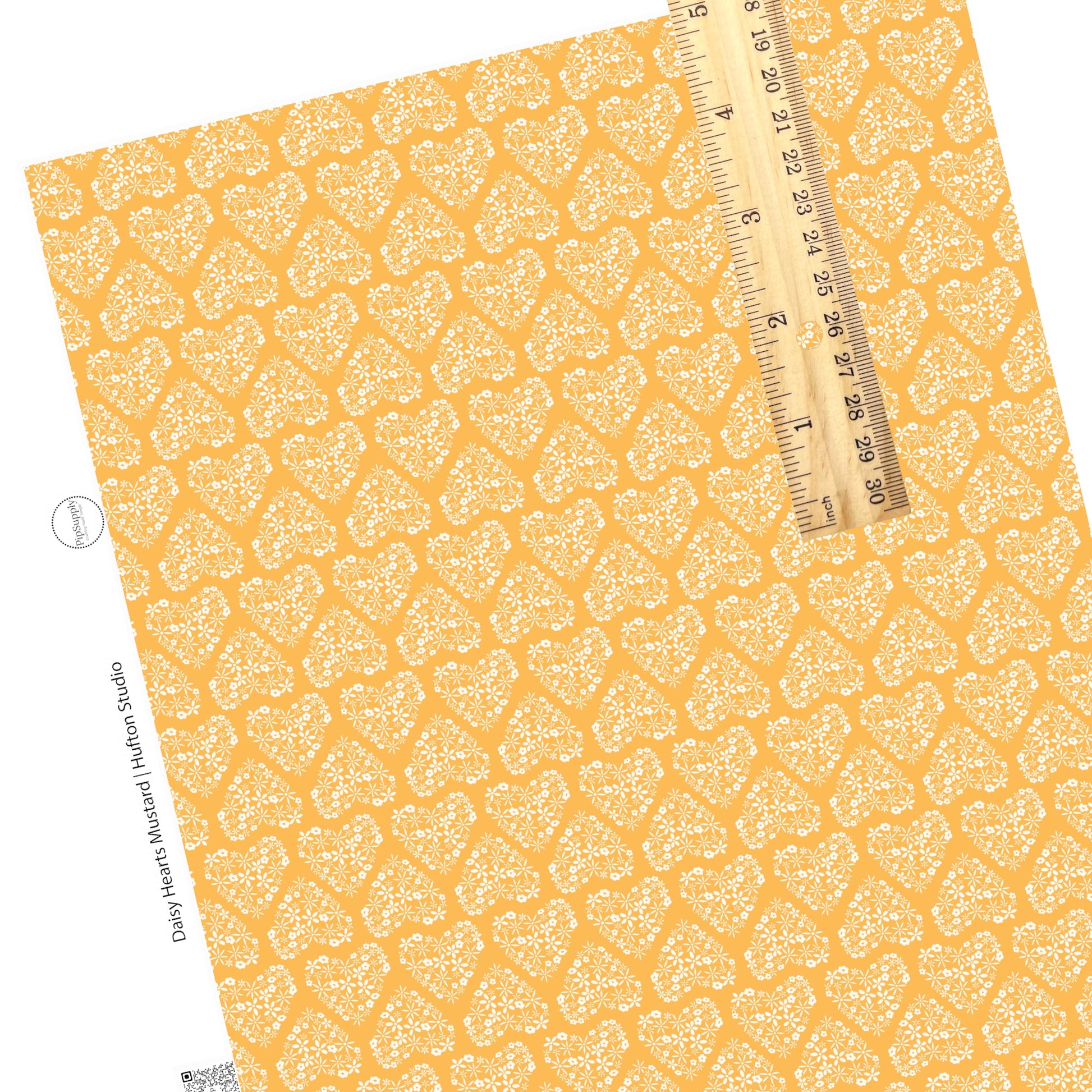 Floral hearts on yellow faux leather sheet