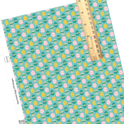 Chevron, polka dots, stripes, and floral easter eggs on aqua faux leather sheets