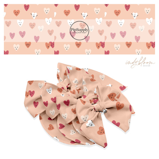 light pink bow strips with scattered hearts with faces bow strips