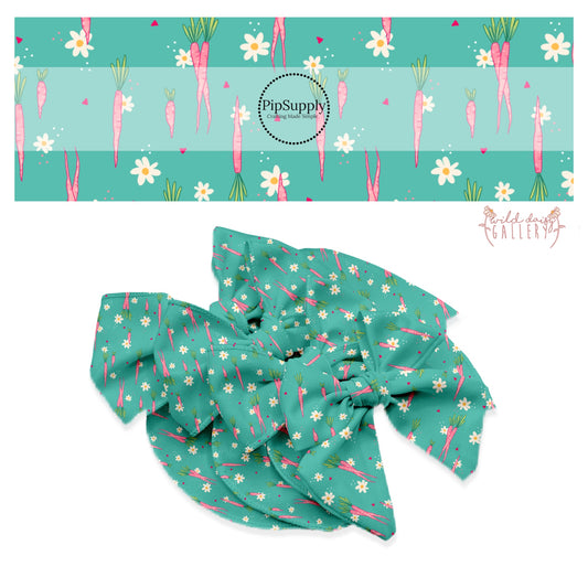 pink carrots, cream flowers, and polka dots on aqua bow strips