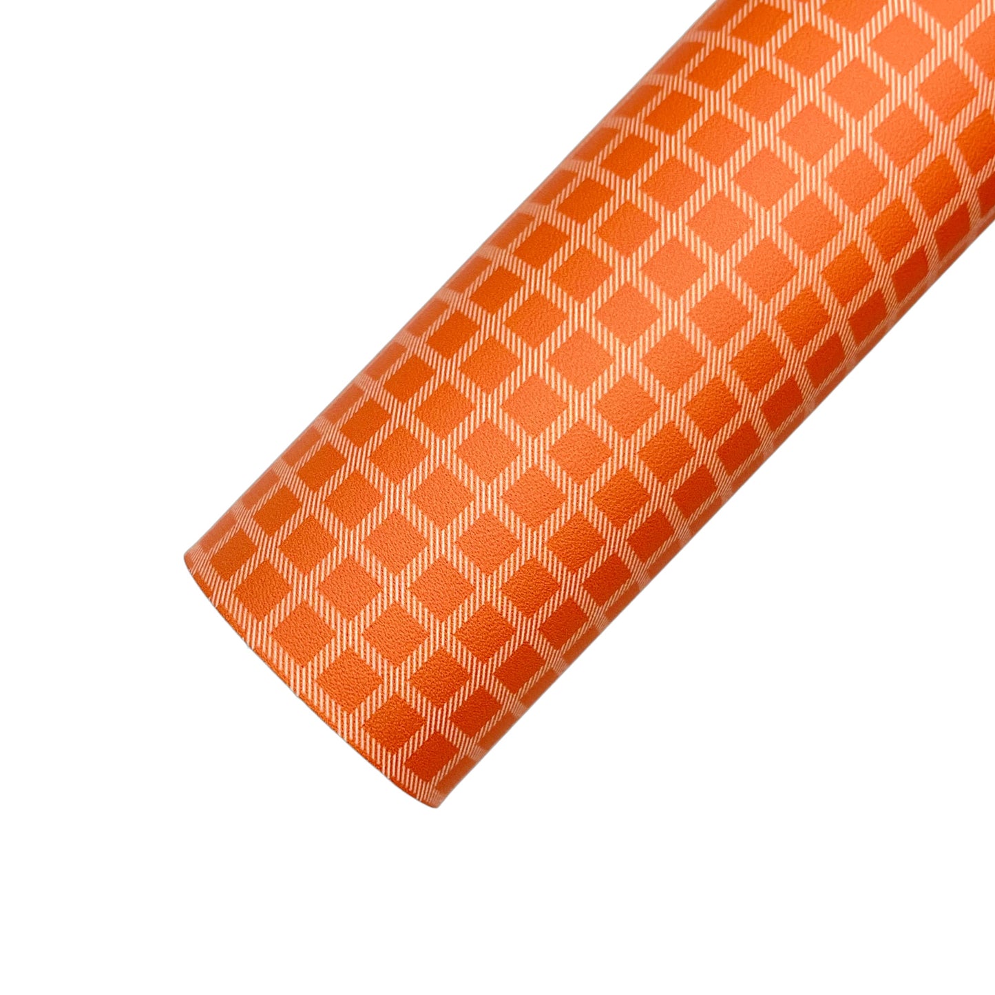 Rolled faux leather sheet with orange and white checkered plaid.
