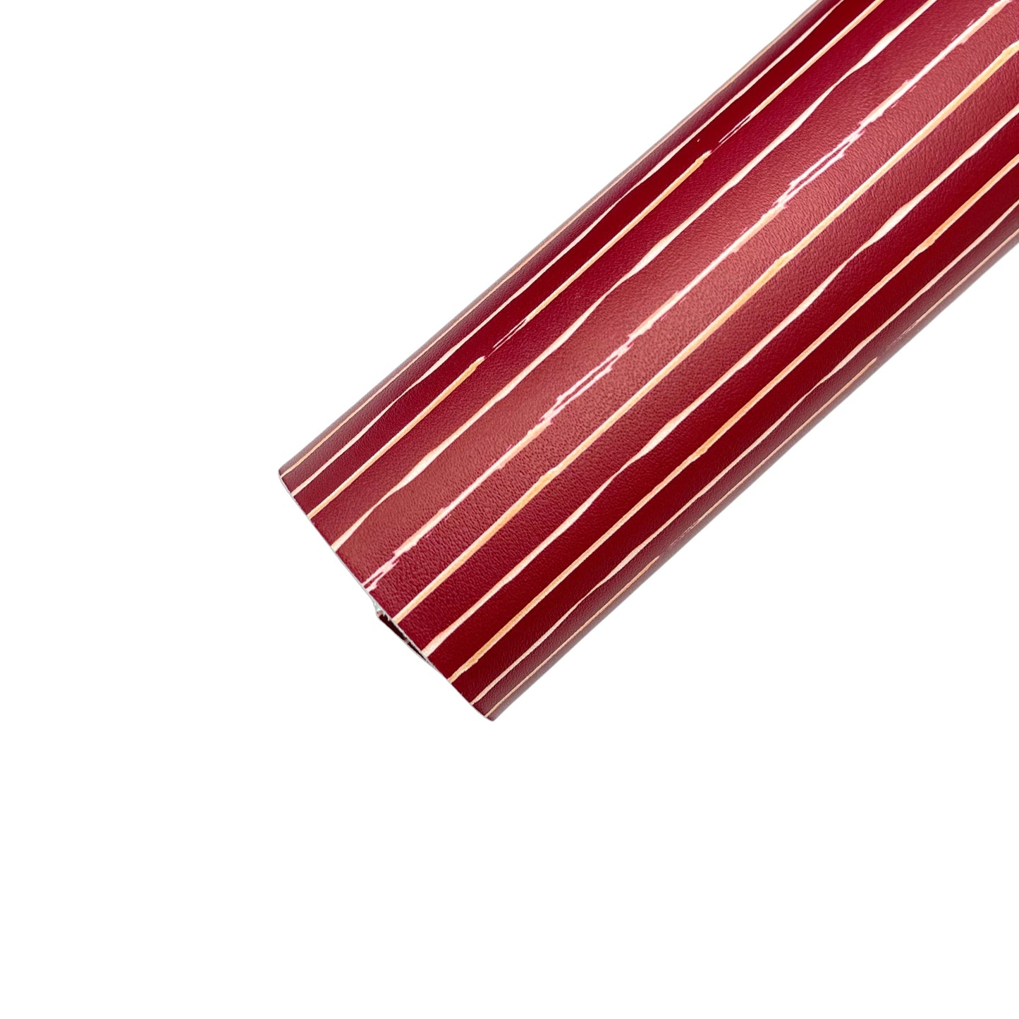 Rolled maroon faux leather sheet with light orange thin paint stripes.