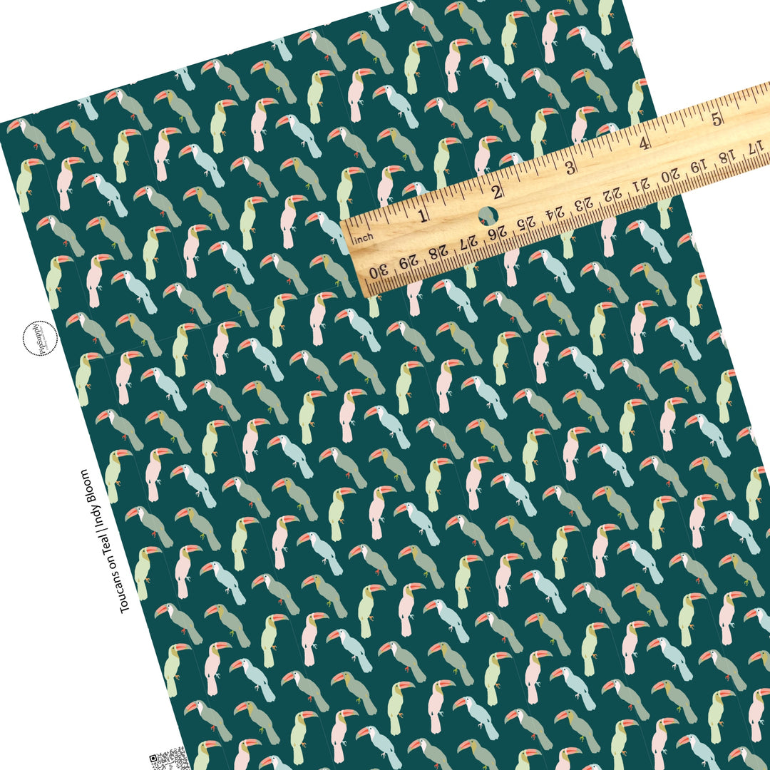 Pink, blue, green, and gray toucans on teal faux leather sheets