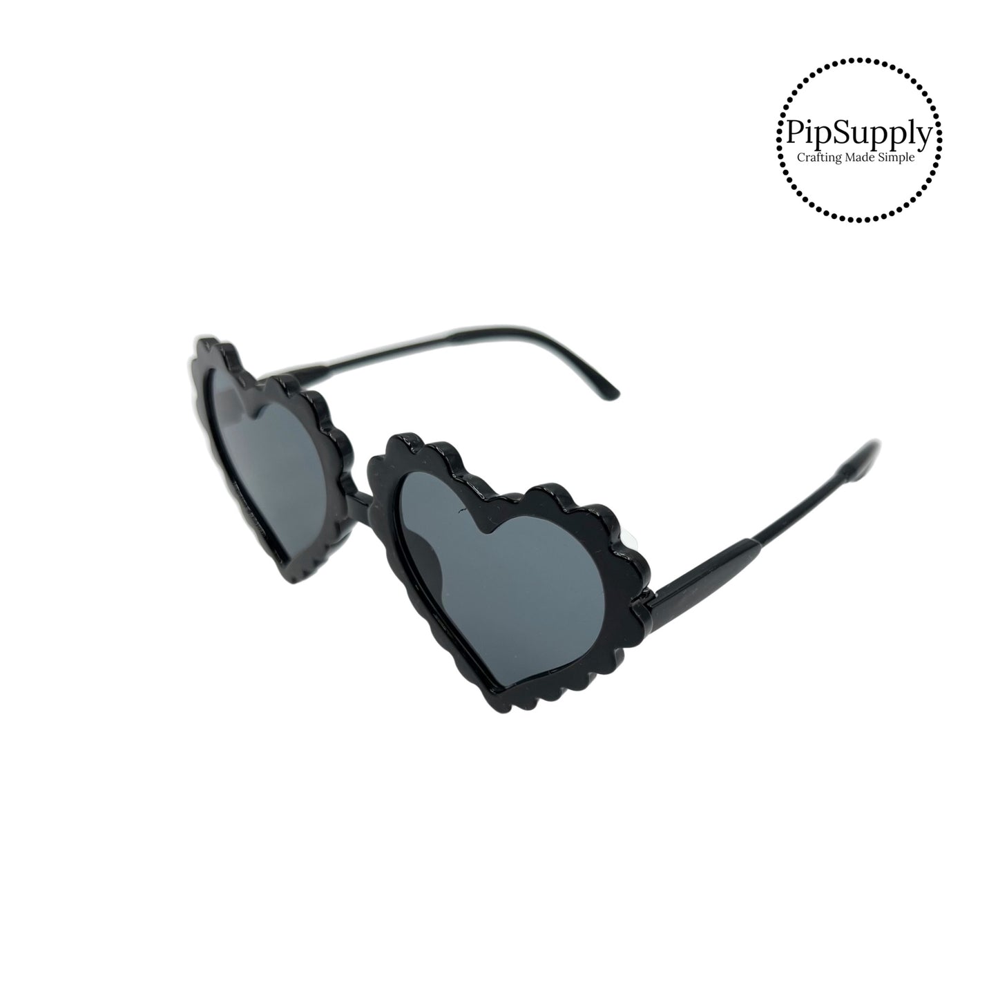 Black heart lenses with black scalloped edges with black temples sunglasses
