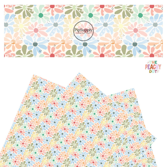 blue, mint, sage, yellow, peach, and pink flowers with tiny white flowers and polka dots on cream faux leather sheets