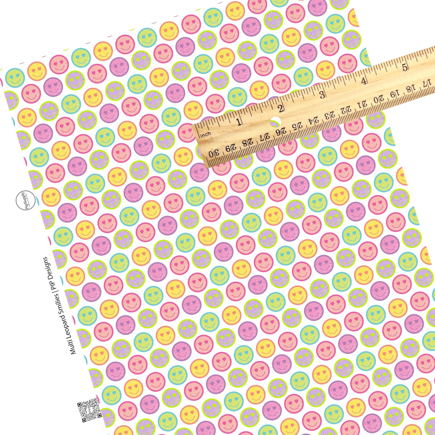 Lime, purple, pink, peach, yellow, and aqua leopard spots on matching smiley faces on white faux leather sheets