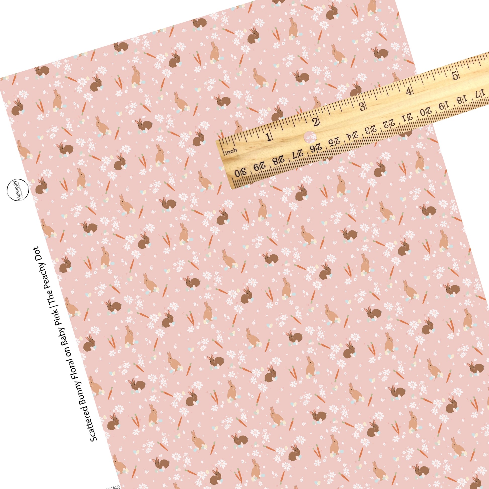 flowers, bunnies, carrots, and eggs on pink faux leather sheets