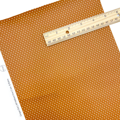 white dots on ginger brown background faux leather sheet