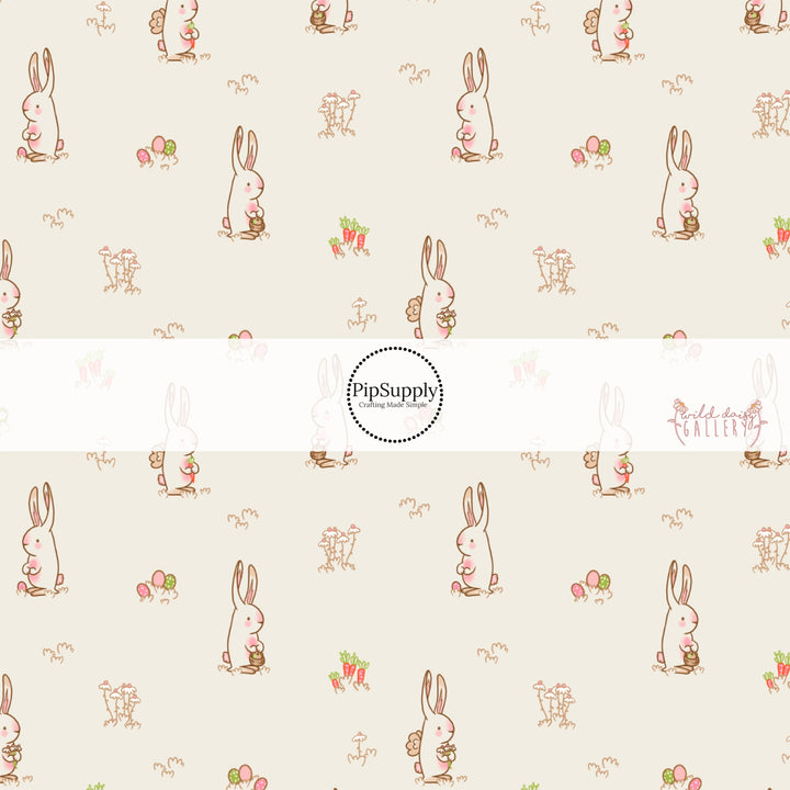 bunny holding easter basket hunting eggs on cream faux leather sheets