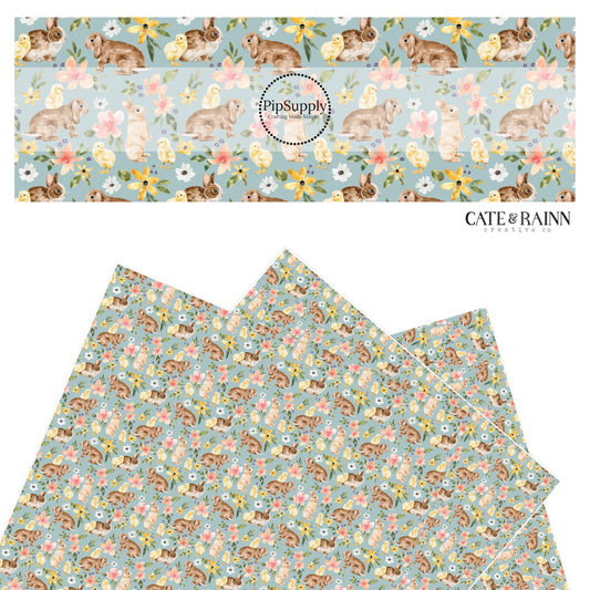 Brown bunnies with yellow chicks with pink, yellow, and white flowers on blue faux leather sheet