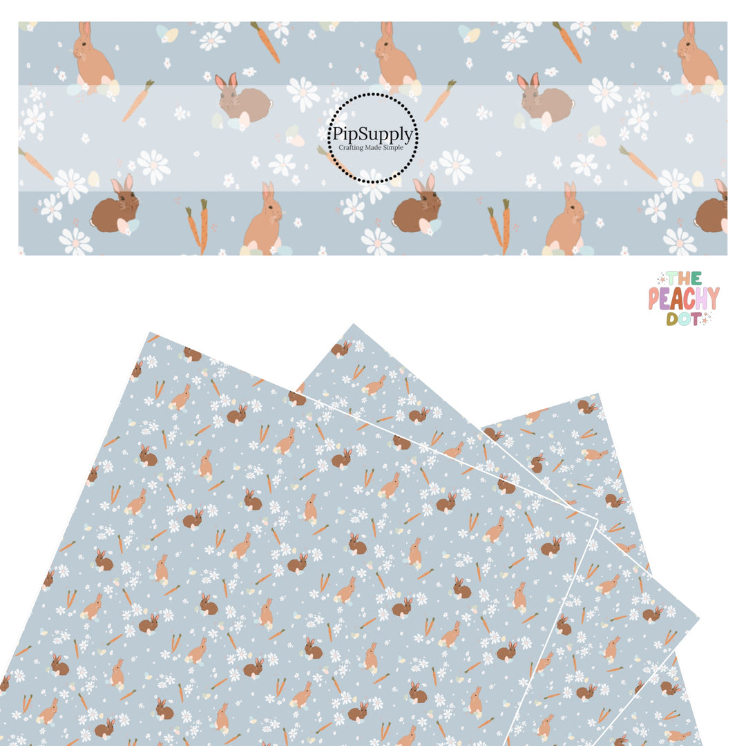 brown bunnies, flowers, carrots, and eggs on blue faux leather sheets