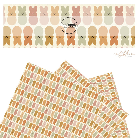 Brown, pink, and green bunnies on cream faux leather sheets