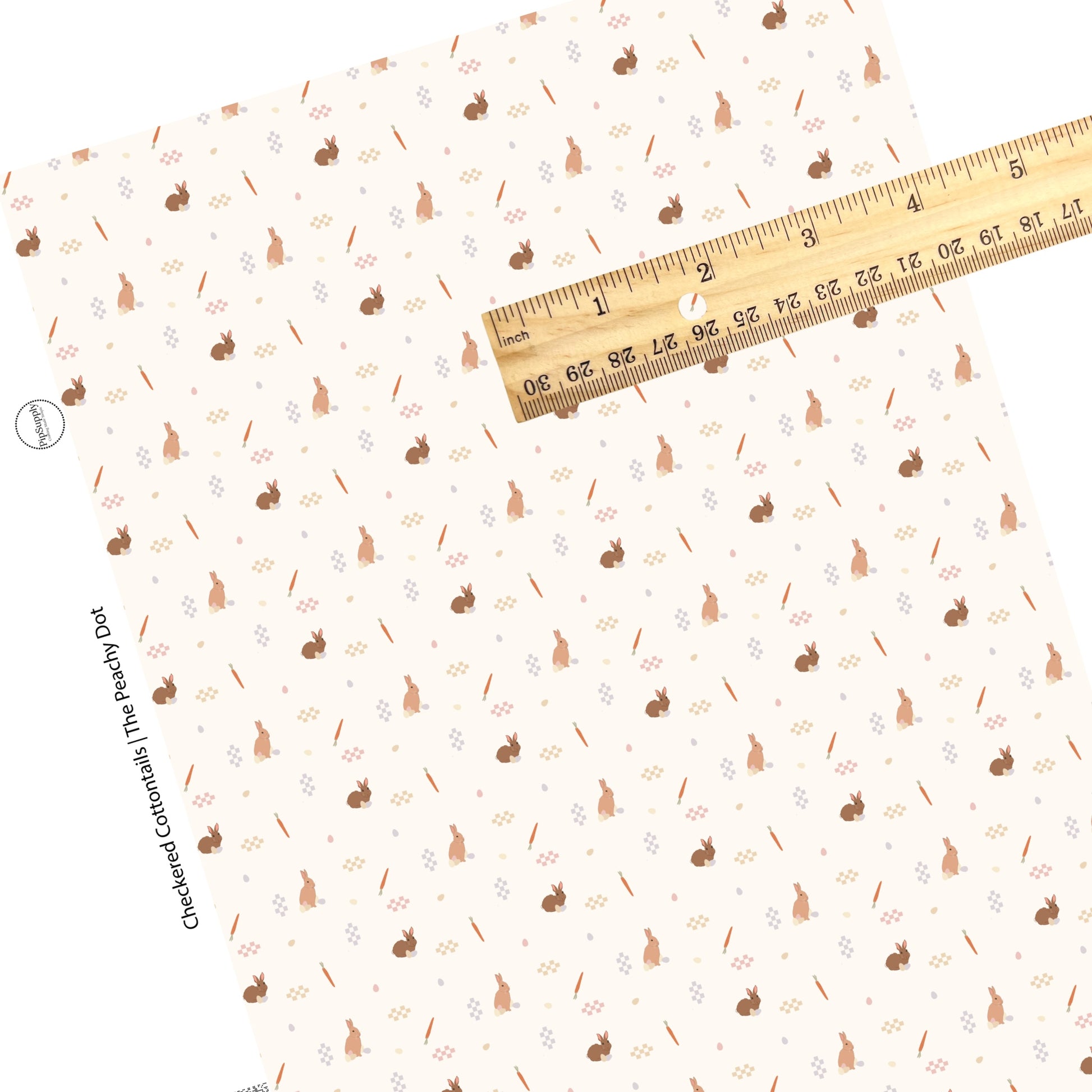 brown bunnies with colorful eggs, carrots, and colorful checkered patches on cream faux leather sheet