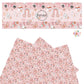 small checker patches, rainbows, butterflies, bunnies, and eggs on pink faux leather sheet