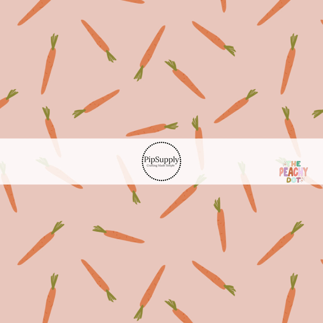 scattered orange carrots on blush bow strips