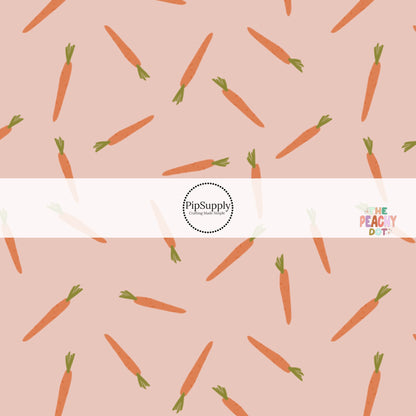 scattered orange carrots on blush bow strips