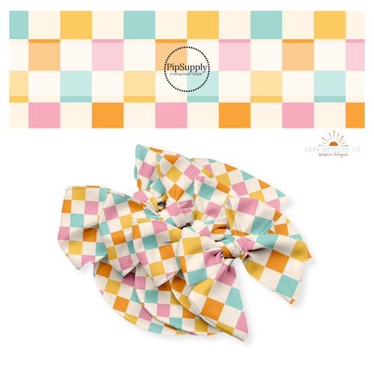Orange, blue, and pink checker with cream tiles bow strips