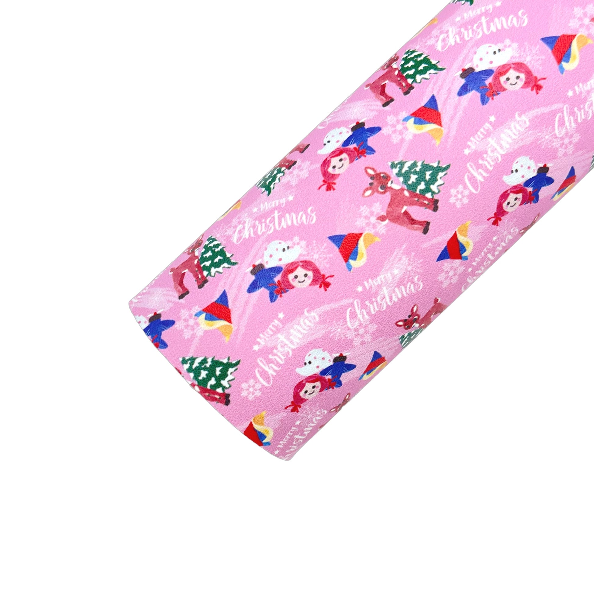 Rolled pink faux leather sheet with reindeer, doll, elephant, toy plane, and Christmas tree pattern.