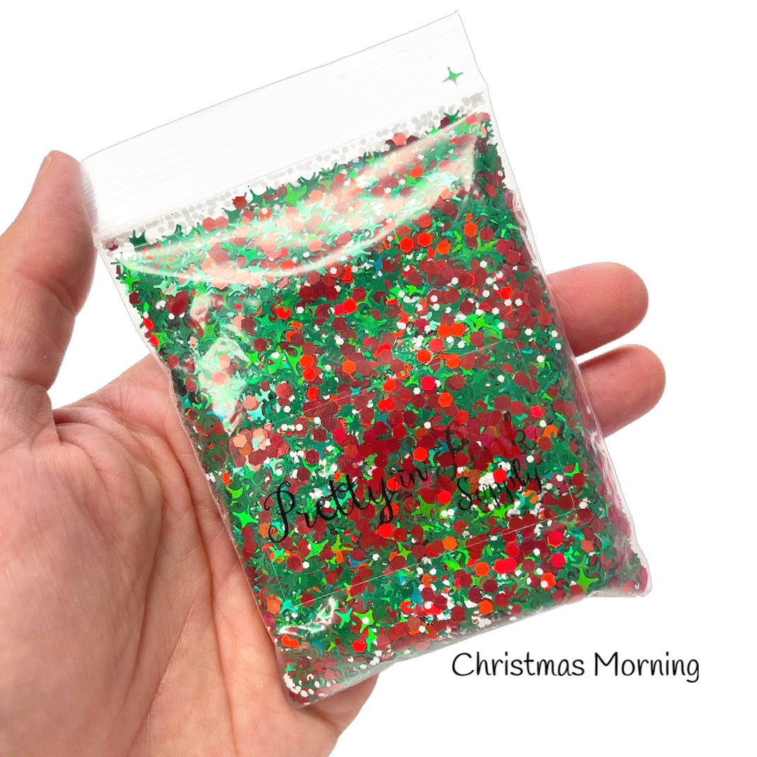 Bag of mixed red glitter, green glitter sparkles, and small white sequin glitter.