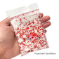 Bag of mixed white sequin snowflakes, red glitter dots, and white glitter dots.