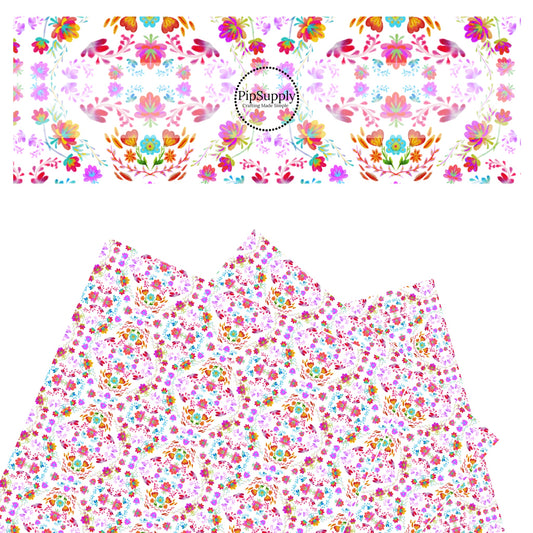 bright blue, red, purple, and yellow kaleidoscope floral on white faux leather sheets