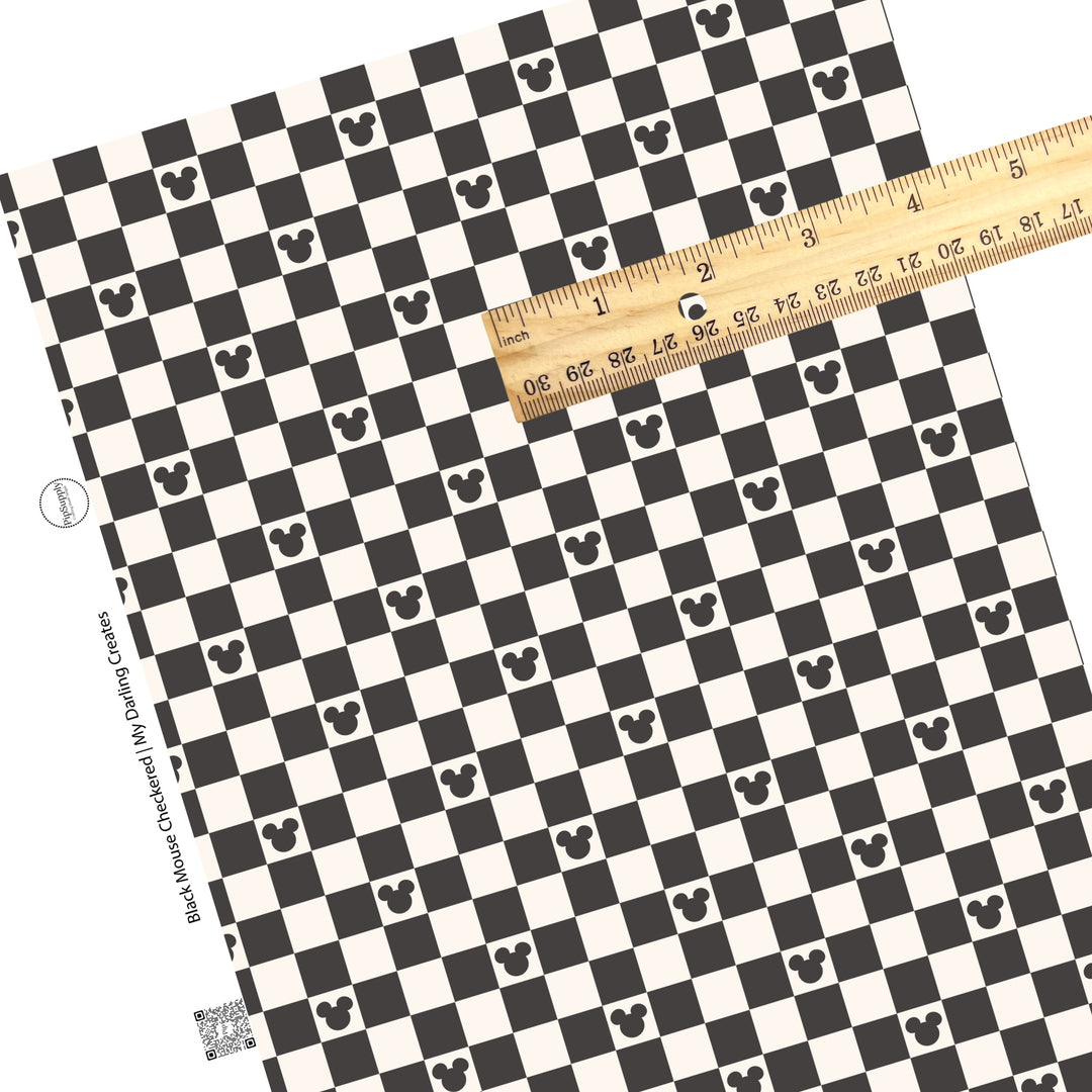 Cream tiles and black mouse head and black checker faux leather sheets