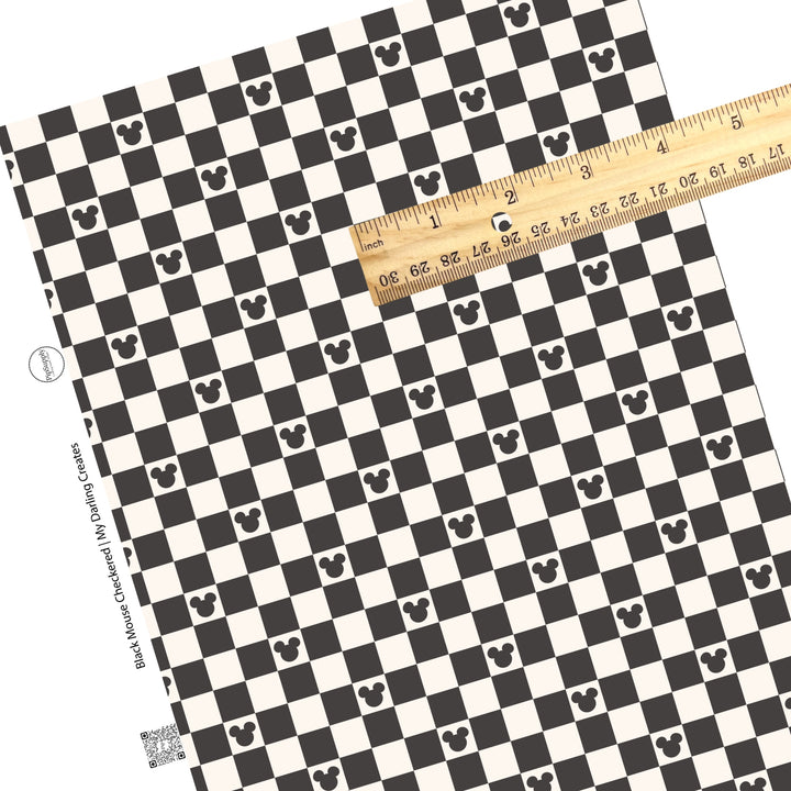 Cream tiles and black mouse head and black checker faux leather sheets