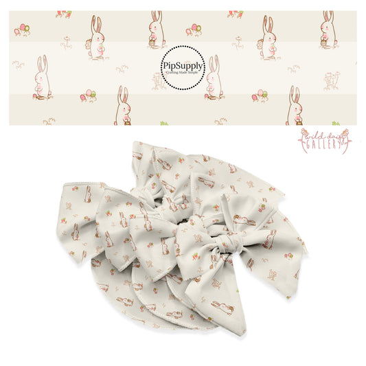 bunnies with pink accents hunting easter eggs on floral cream faux leather sheets