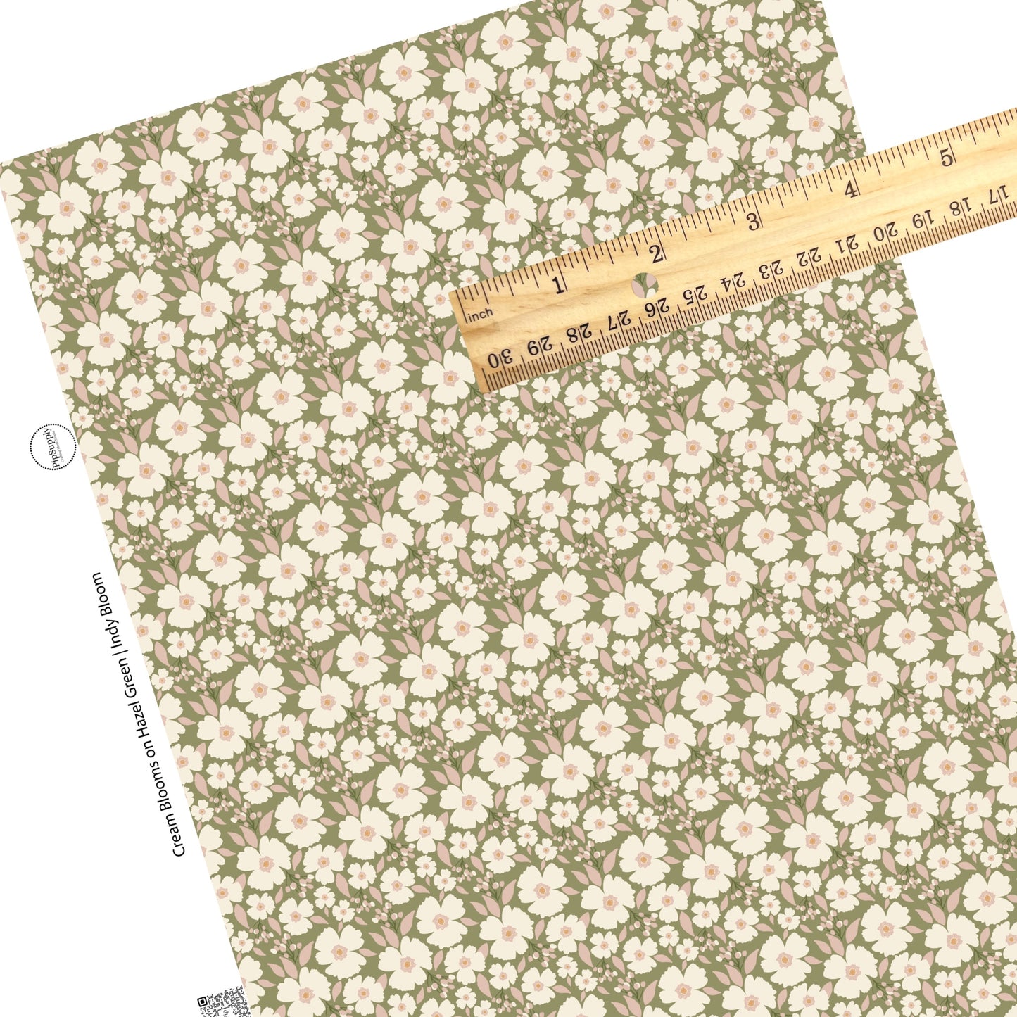 Cream tiny and big flowers on green faux leather shetes