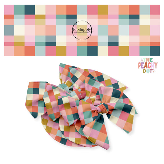 Navy, blue, pink, green, and cream multi checkered bow strips
