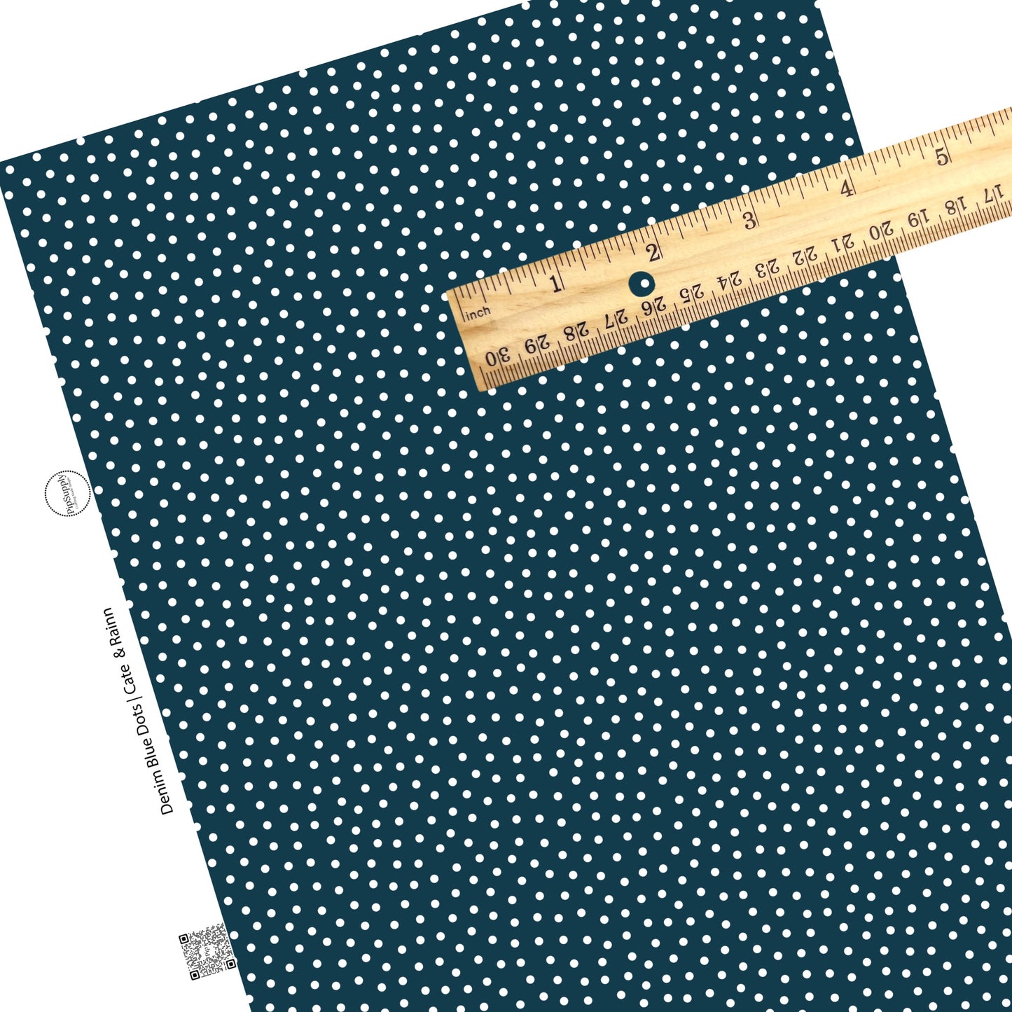 White polka dots on navy blue faux leather sheets