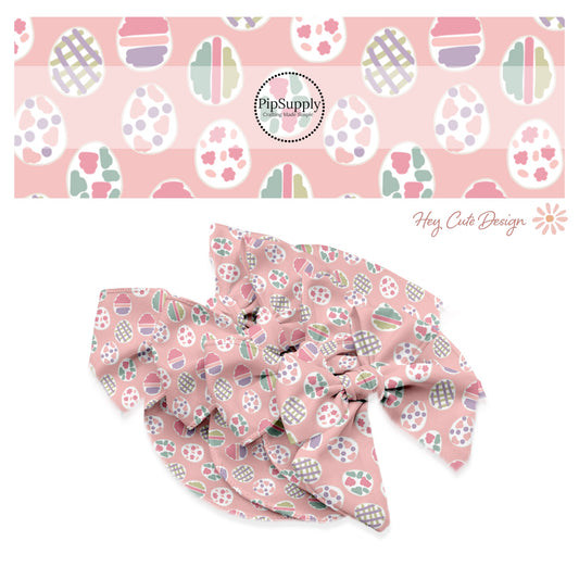 pastel patterned easter eggs on light pink bow strips