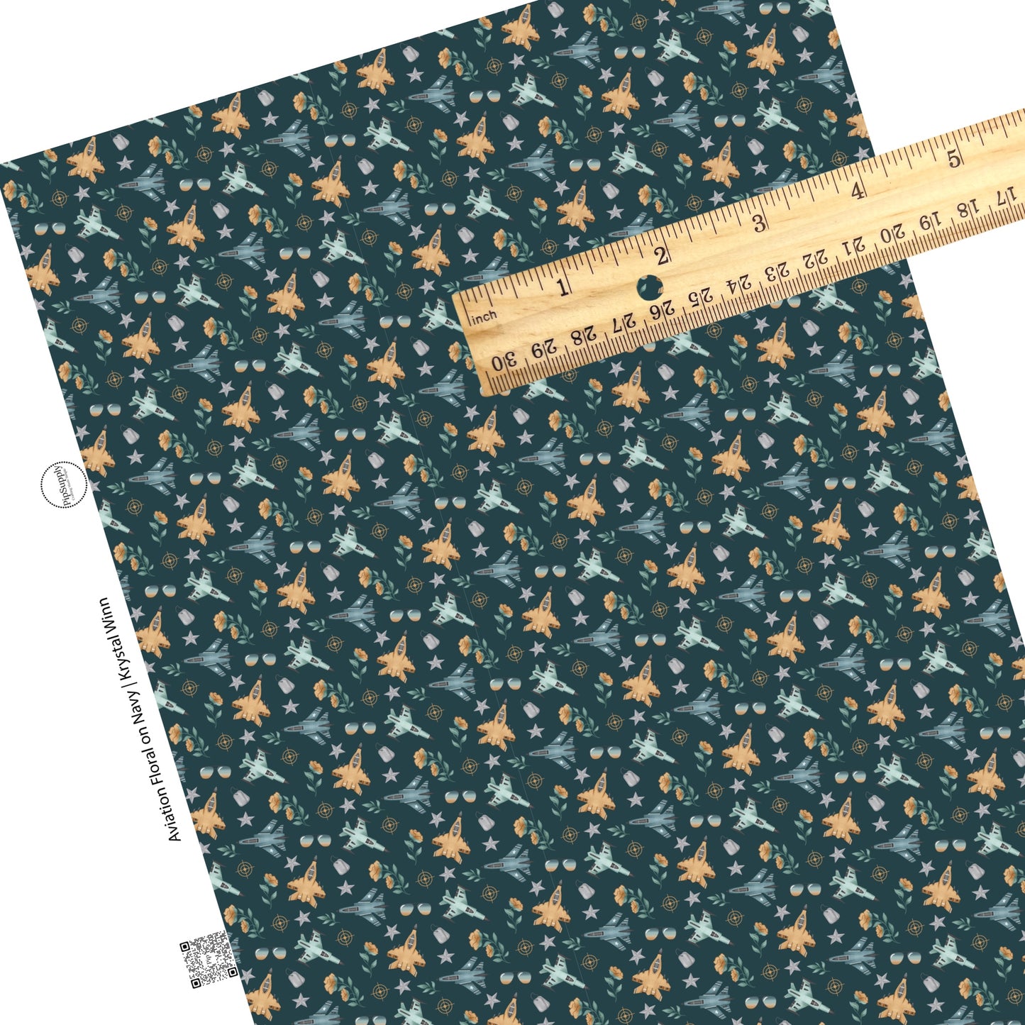 flowers, airplanes, stars, dog tags, bullseye, and sunglasses on navy faux leather sheets