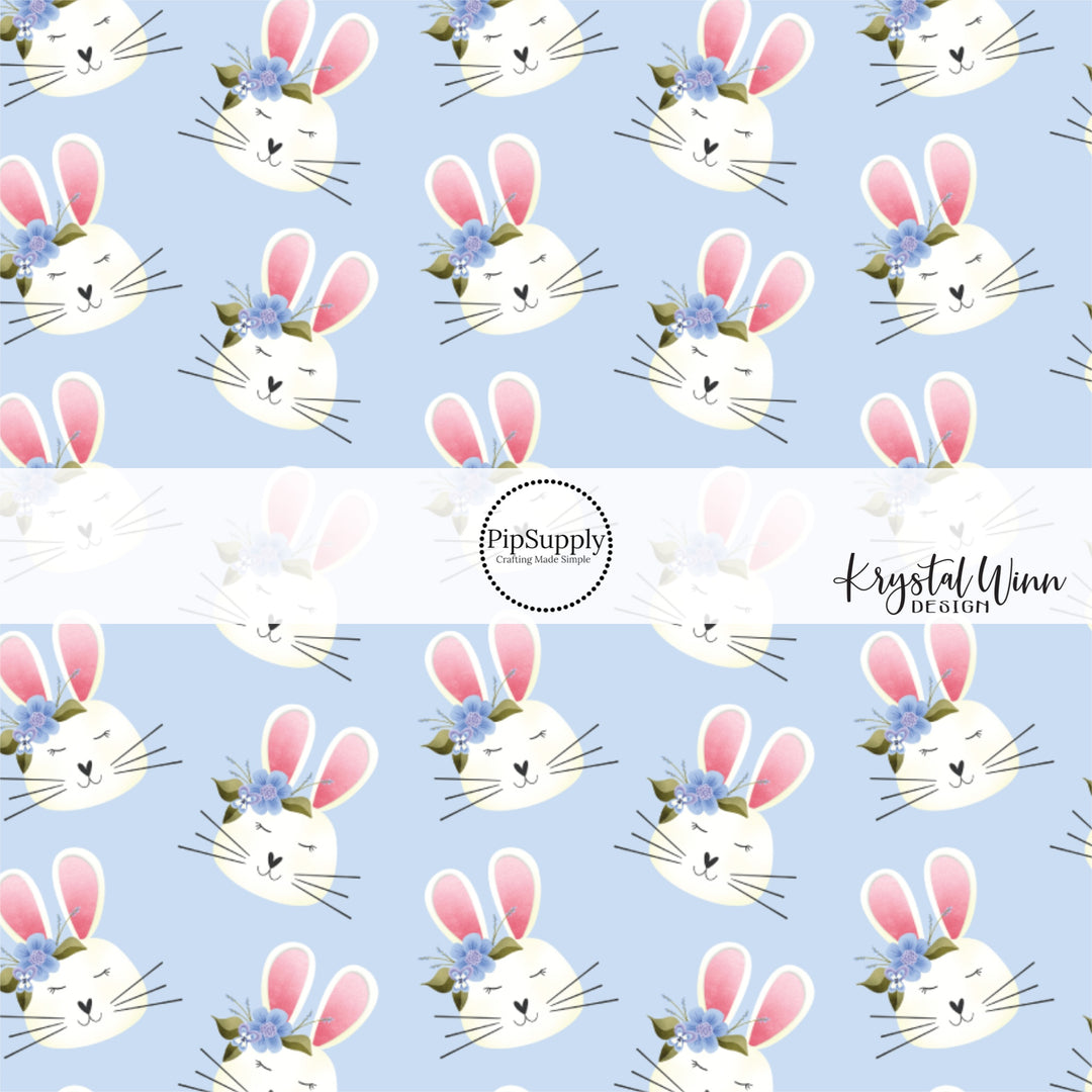 white bunnies with floral crown on blue bow strips