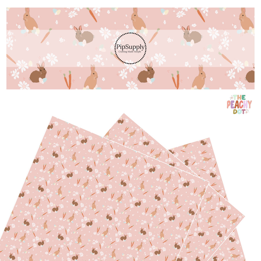 brown bunnies, orange carrots, easter eggs, and flowers on pink faux leather sheets