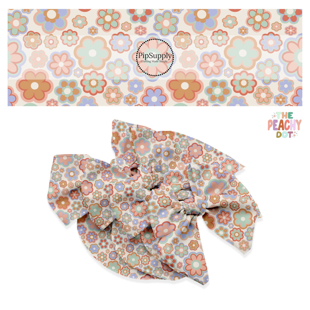 lavender, mint, and peach multi colored flowers on light peach bow strips