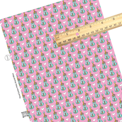 Floral turquoise guitars and white hearts on pink faux leather sheets
