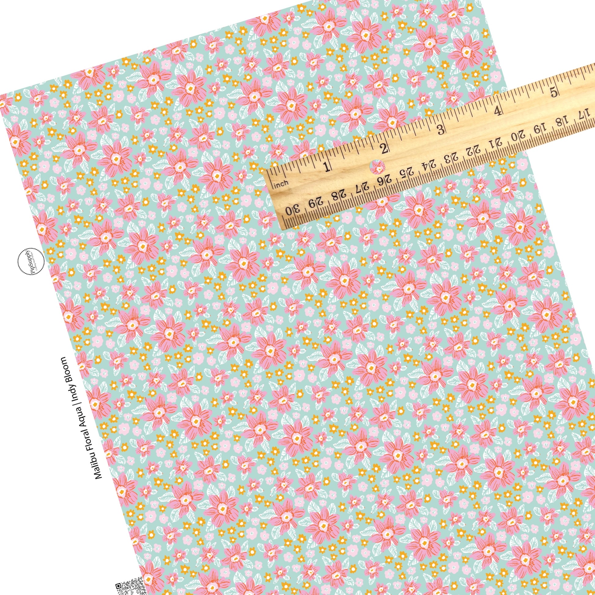 Multi pink, white, and orange flowers on aqua faux leather sheets