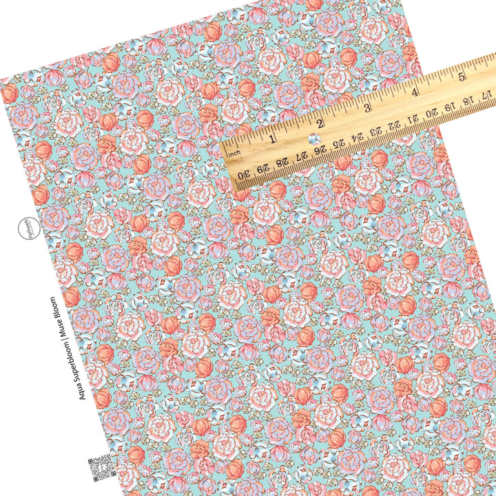 Multi peach, lavender, and pink floral on aqua faux leather sheets