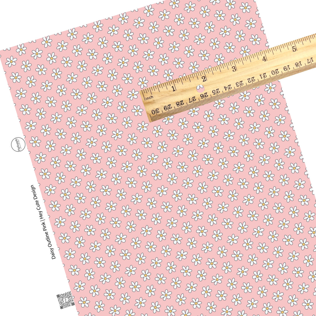 white daisies on pink faux leather sheets