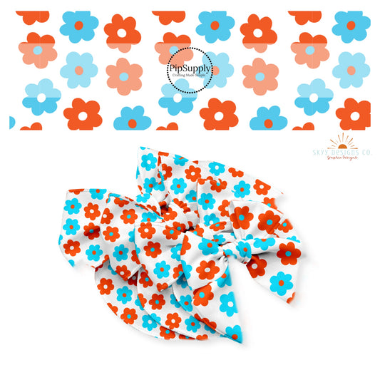 Red and blue daisies on white bow strips