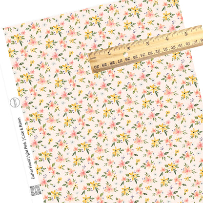 White, pink, and yellow flowers on light pink faux leather sheets